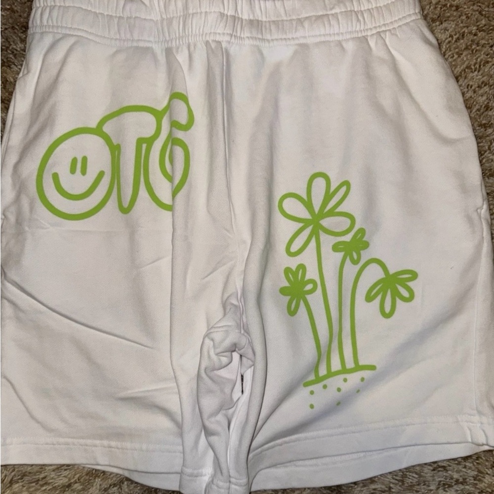 White Athletic Shorts with Green Graphic